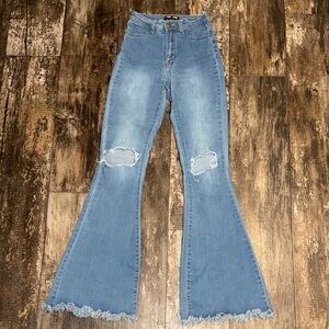 Chic Blue Flare Jeans with Distressed Details